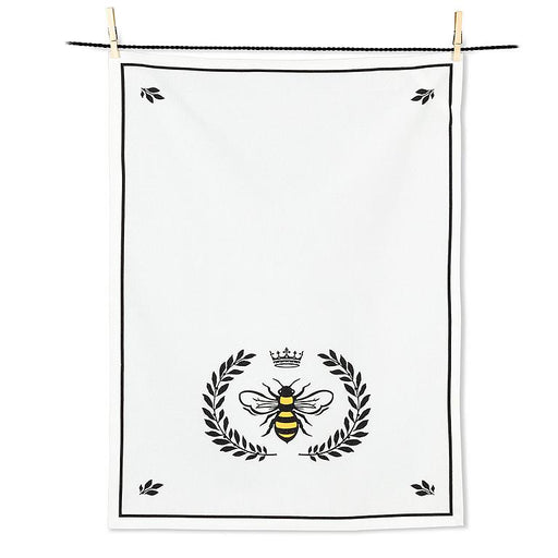 Bee crest cotton kitchen towel with black border and yellow bee design hanging on display