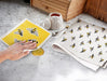 bees dishcloth in use cleaning kitchen surface