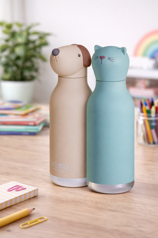 Pepper the Dog and Kiki the Cat Besties character bottles on desk lifestyle setup