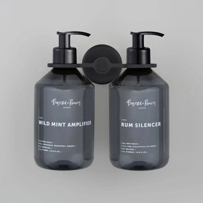 Buster + Punch Cast double dispenser soap holder with matching Buster + Punch dispenser bottles in welders black finish