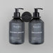 Buster + Punch Cast double dispenser soap holder with matching Buster + Punch dispenser bottles in welders black finish