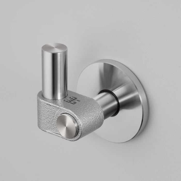 Angled detail view of Buster + Punch Cast hook in steel finish