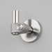Buster + Punch Cast hook in steel finish mounted on wall