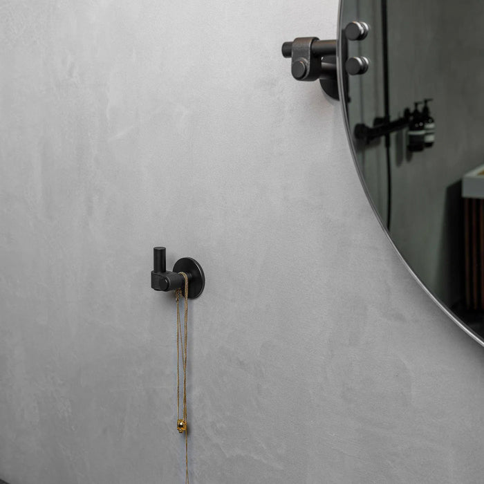 Buster + Punch Cast hook in Welders Black installed in contemporary bathroom interior