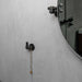 Buster + Punch Cast hook in Welders Black installed in contemporary bathroom interior