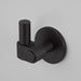 Close detail of Buster + Punch Cast hook in Welders Black finish