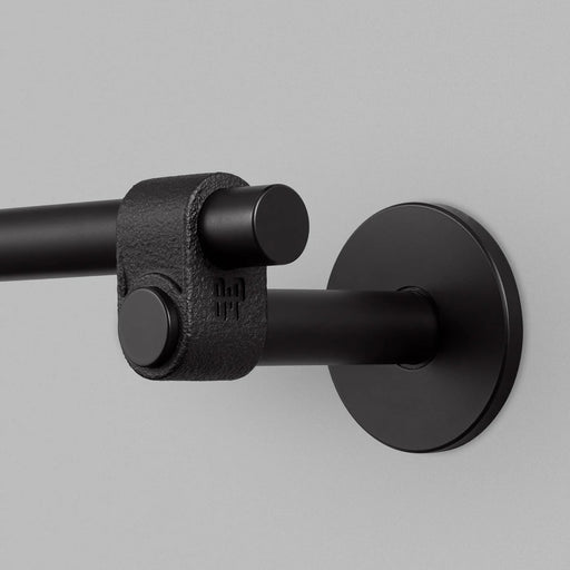 Close-up detail of Buster + Punch Cast medium towel rail in welders black finish