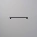 Front view of Buster + Punch Cast medium towel rail in welders black finish