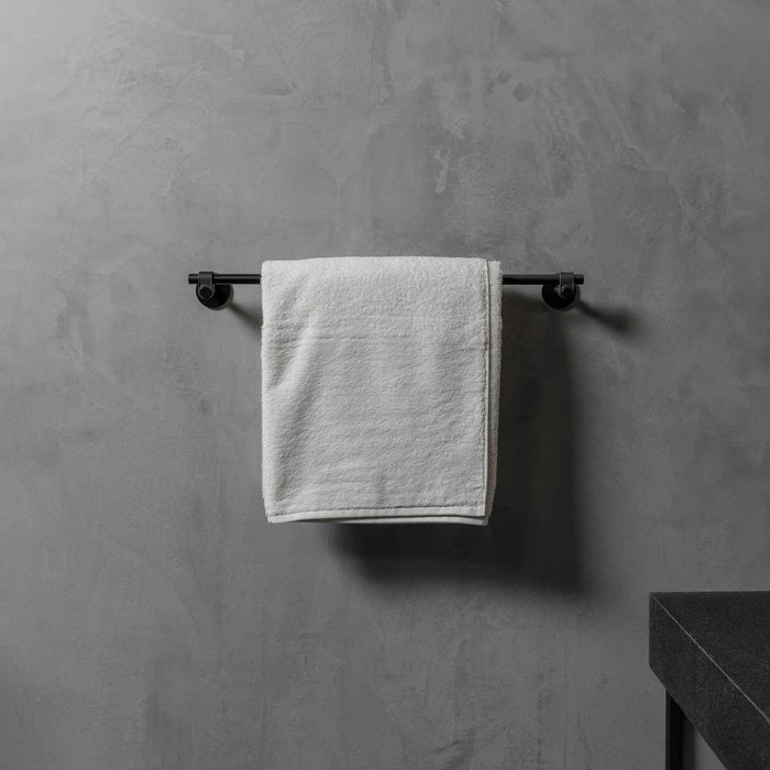 Installed Buster + Punch Cast medium towel rail in welders black finish