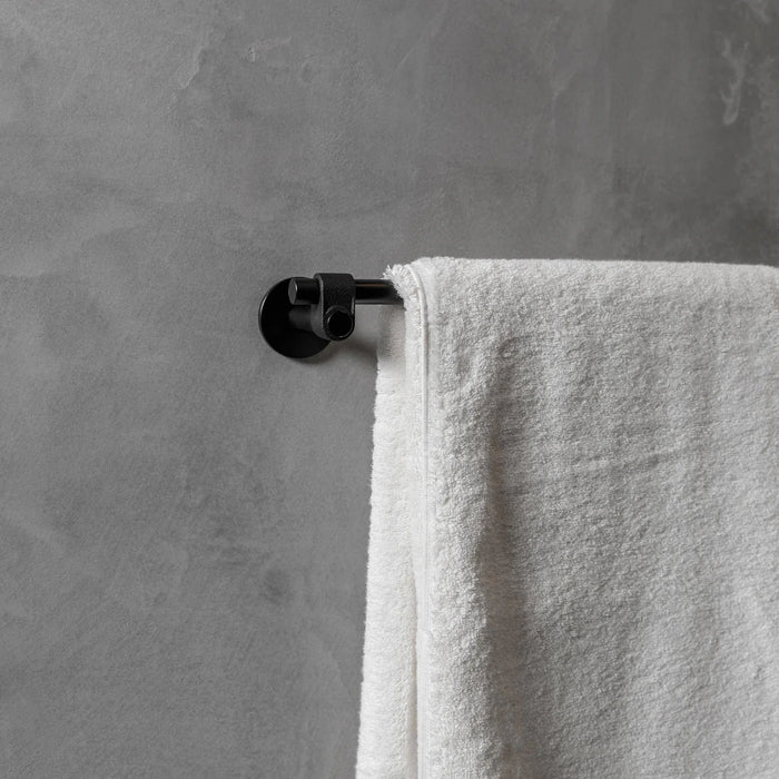 Buster + Punch Cast medium towel rail in welders black finish with white towel