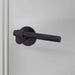 Side profile of Buster + Punch Cast Passage Door Handle Set in Welders Black finish