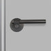 Front profile of Buster + Punch Cast Privacy Door Handle Set in Smoked Bronze finish