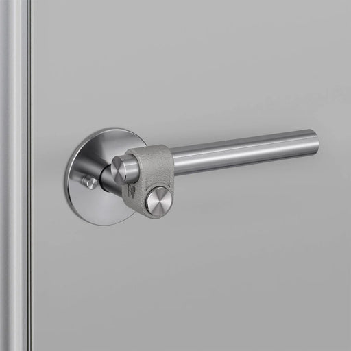 Angled view of Buster + Punch Cast Privacy Door Handle Set in Steel finish