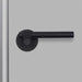 Front profile of Buster + Punch Cast Privacy Door Handle Set in Welders Black finish