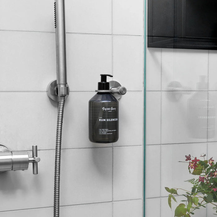 Installed Buster + Punch Cast single dispenser soap holder in modern bathroom setting