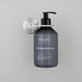 Buster + Punch Cast single dispenser soap holder in steel finish holding soap dispenser bottle