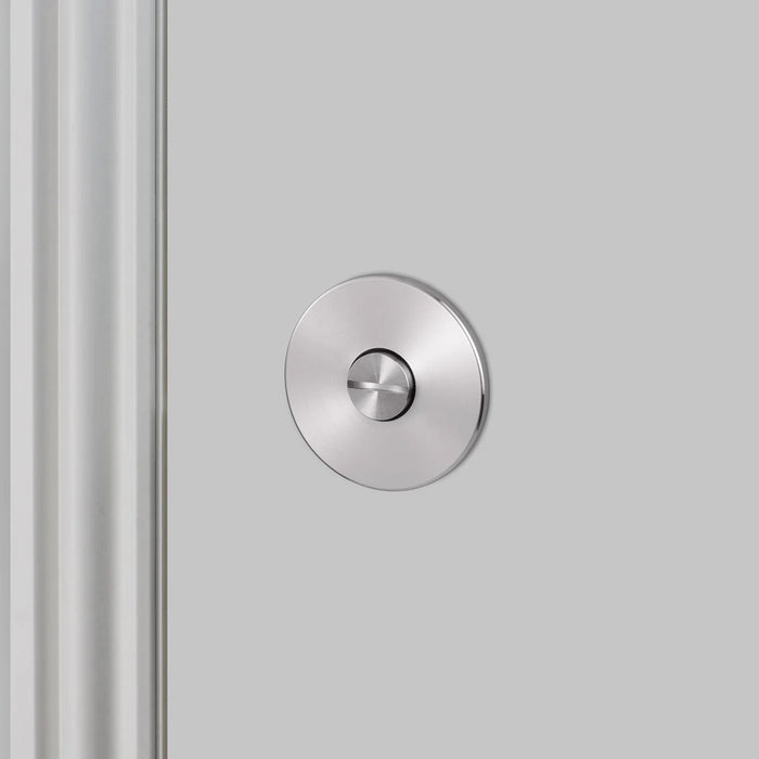 Front view of Buster + Punch Cast thumbturn lock in steel finish for modern interior doors