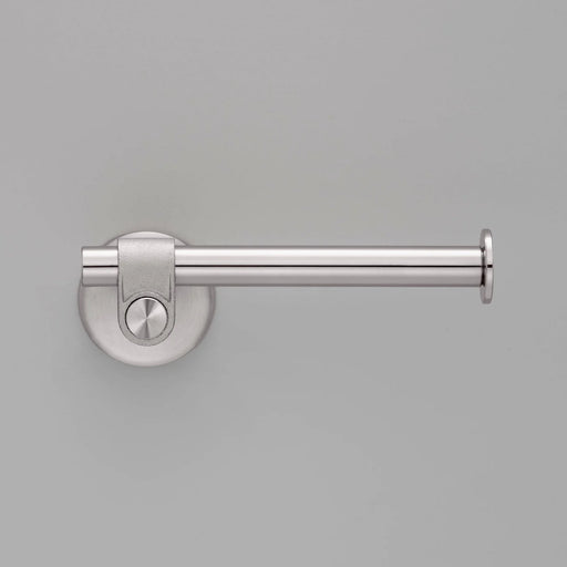 Front view of Buster + Punch Cast toilet roll holder in steel finish