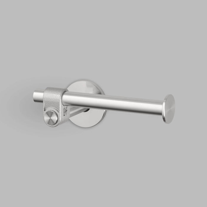 Side profile of Buster + Punch Cast toilet roll holder in steel finish