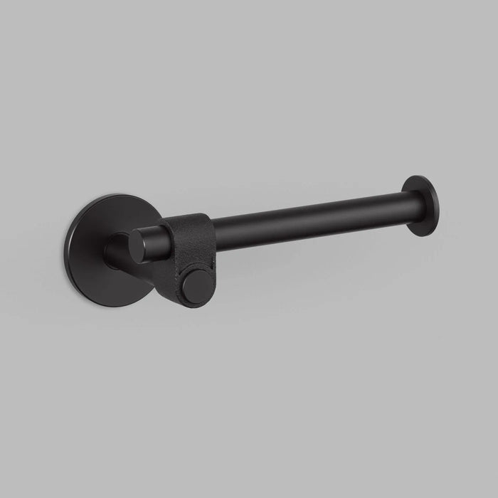 Angled view of Buster + Punch Cast toilet roll holder in welders black finish