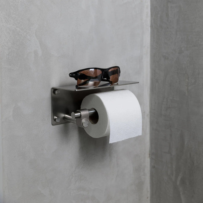 Installed Buster + Punch Cast toilet roll holder with shelf in welders steel finish