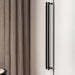Buster + Punch black closet bar installed beside curtain wardrobe system