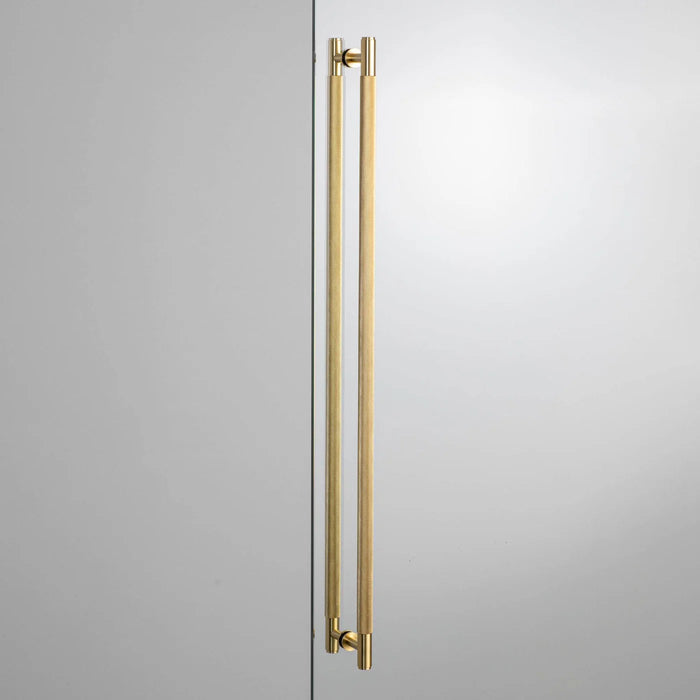 Buster + Punch Closet Bar Double-Sided Cross in Brass finish on luxury wardrobe door