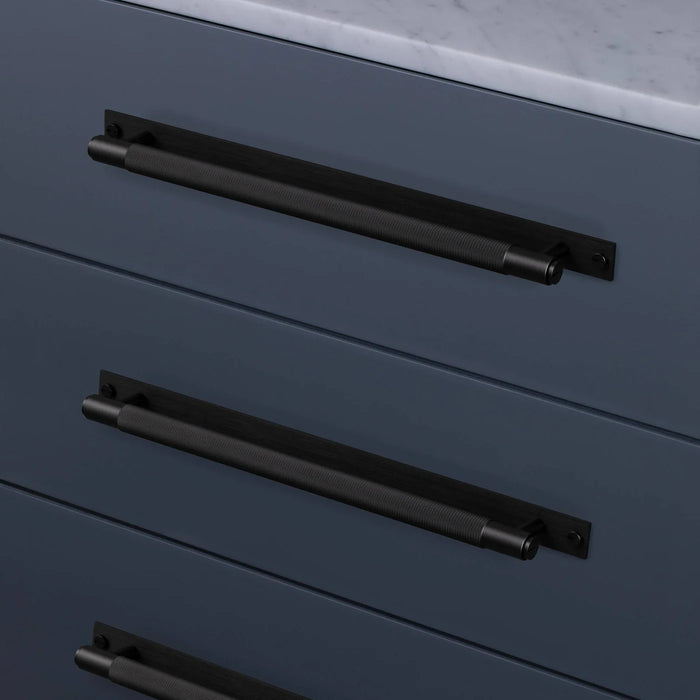Black Buster + Punch Cross Pull Bar with Backplate installed on contemporary cabinetry large size