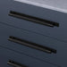 Black Buster + Punch Cross Pull Bar with Backplate installed on contemporary cabinetry large size