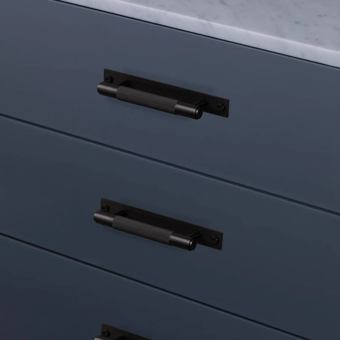 Black Buster + Punch Cross Pull Bar with Backplate installed on modern drawers small size