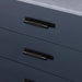 Black Buster + Punch Cross Pull Bar with Backplate installed on modern drawers small size