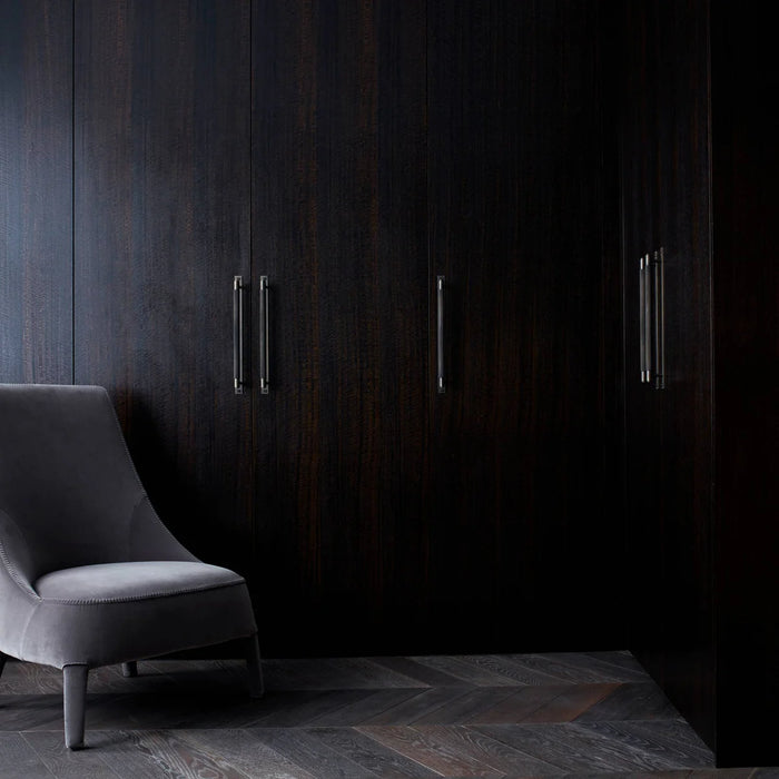Buster + Punch Cross Pull Bar with Backplate in Smoked Bronze finish installed on luxury wardrobe cabinetry