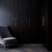 Buster + Punch Cross Pull Bar with Backplate in Smoked Bronze finish installed on luxury wardrobe cabinetry