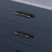Buster + Punch Cross Pull Bar with Backplate installed on modern cabinet drawers small size smoked bronze finish