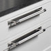 Steel Buster + Punch Cross Pull Bar with Backplate close up installed on white drawers