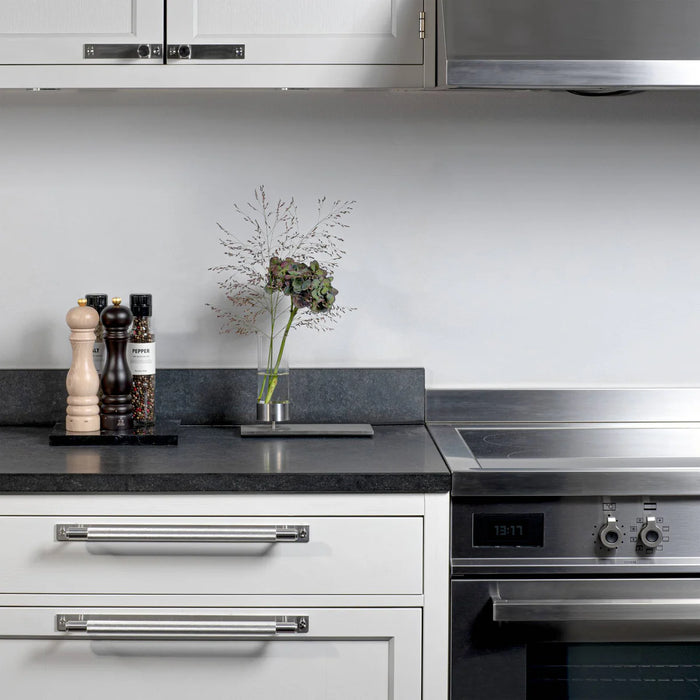 Buster + Punch Cross Pull Bar with Backplate in Steel finish on modern white kitchen cabinetry