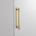 Buster + Punch Double-Sided Pull Bar Cross in brass finish front view