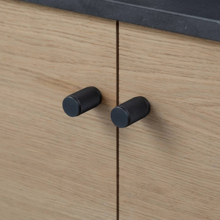 Buster + Punch Furniture Knob Cross in smoked bronze finish featured in luxury cabinetry
