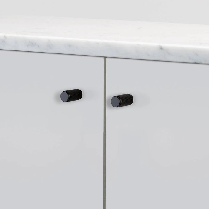 Buster + Punch Furniture Knob Linear in Black finish on cabinet doors