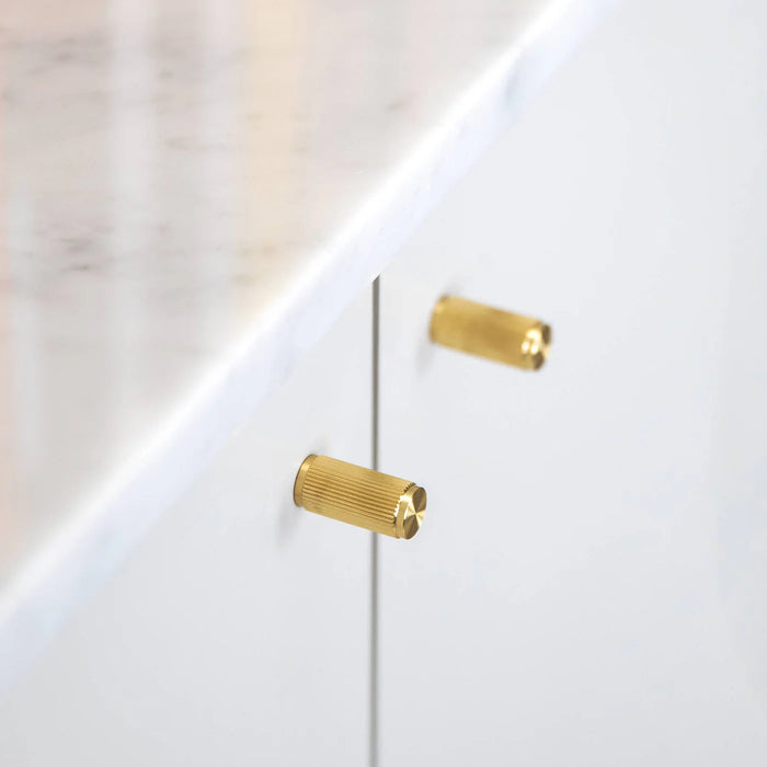 Side angle view of Buster + Punch Furniture Knob Linear in Brass finish