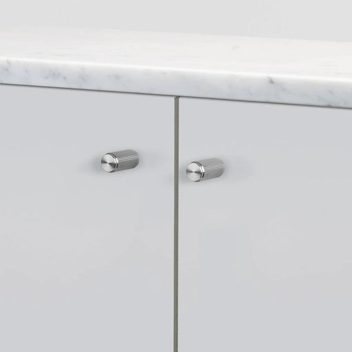 Buster + Punch Furniture Knob Linear in Steel finish installed on cabinet doors