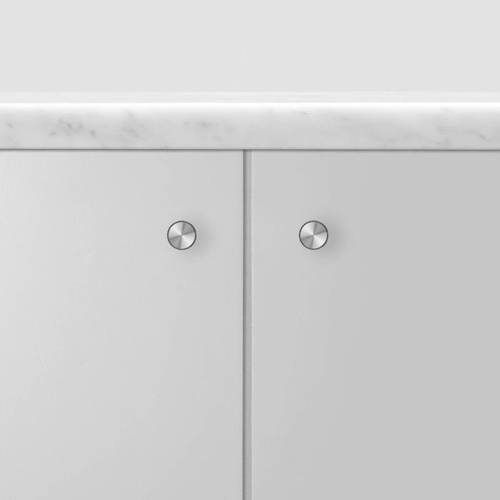 Modern cabinet doors featuring Buster + Punch Linear Steel furniture knobs