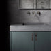 Luxury bathroom vanity featuring Buster + Punch Cross Smoked Bronze knob plates