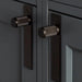 Modern bathroom cabinetry with Buster + Punch Smoked Bronze knob plates