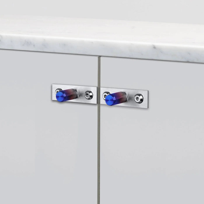 Close-up of Buster + Punch Furniture Knob Plate Linear in Burnt Steel finish