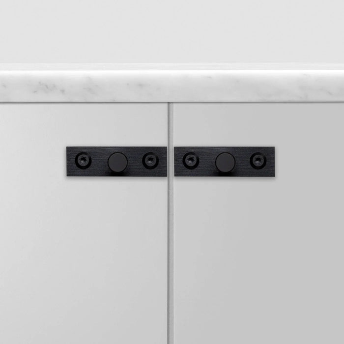Modern drawer cabinetry featuring Buster + Punch Linear Gun Metal knob plates