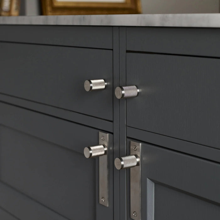 Buster + Punch Furniture Knob Cross in steel finish on dark cabinetry