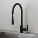Angled view of Buster + Punch welder's black kitchen faucet