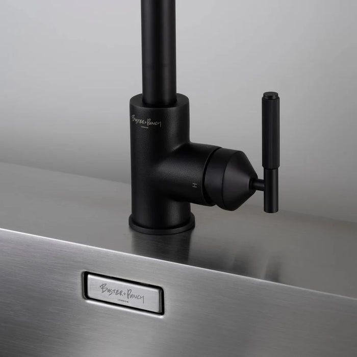 Close-up of Buster + Punch welder's black kitchen faucet handle