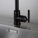 Close-up of Buster + Punch welder's black kitchen faucet handle